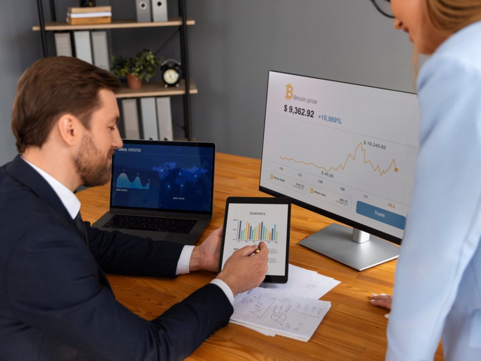 person-looking-finance-graphs